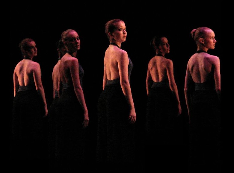 Photograph of modern dancers in a line