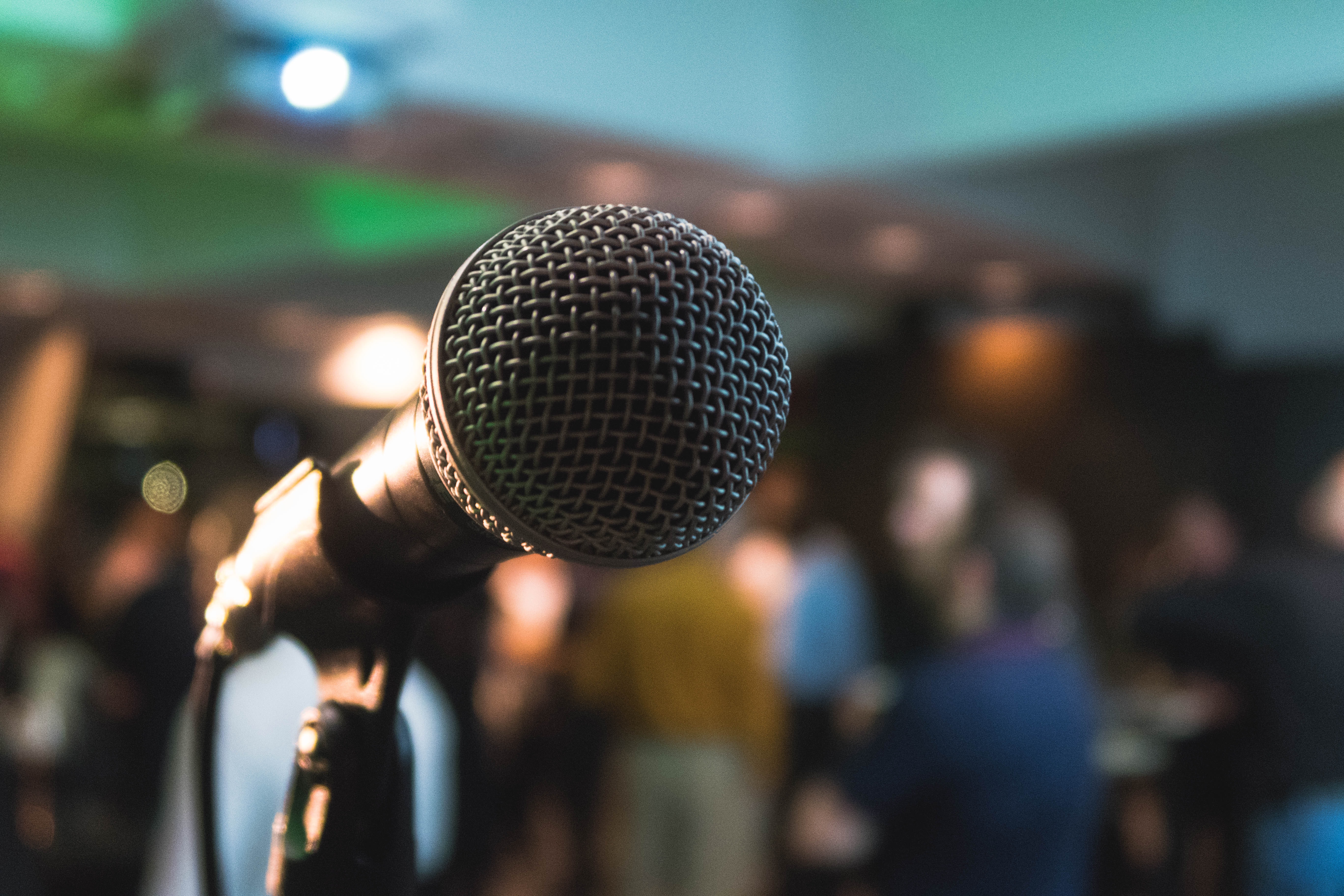 A microphone with a blurred background.