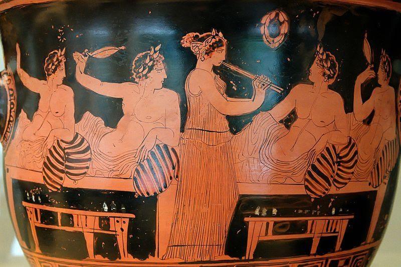 Depiction of a symposium from c. 420 BCE, featuring a female entertainer - most likely a slave and obliged to provide sex as 